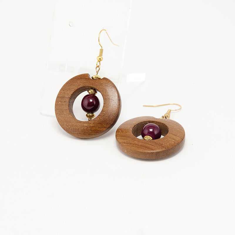 Gold Victoria. Iroko Circle Wooden Earrings with Gold plated Zamak and Dark purple beads A046-4