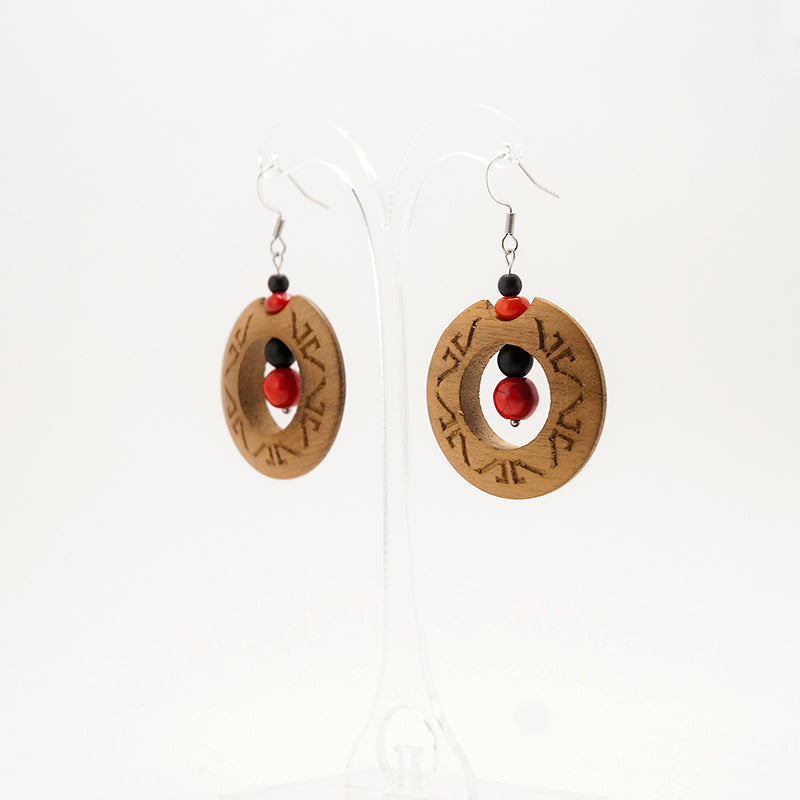 Dipti. Iroko Circle Wooden Earrings with Engraved surface and Red - Black beads A056-1