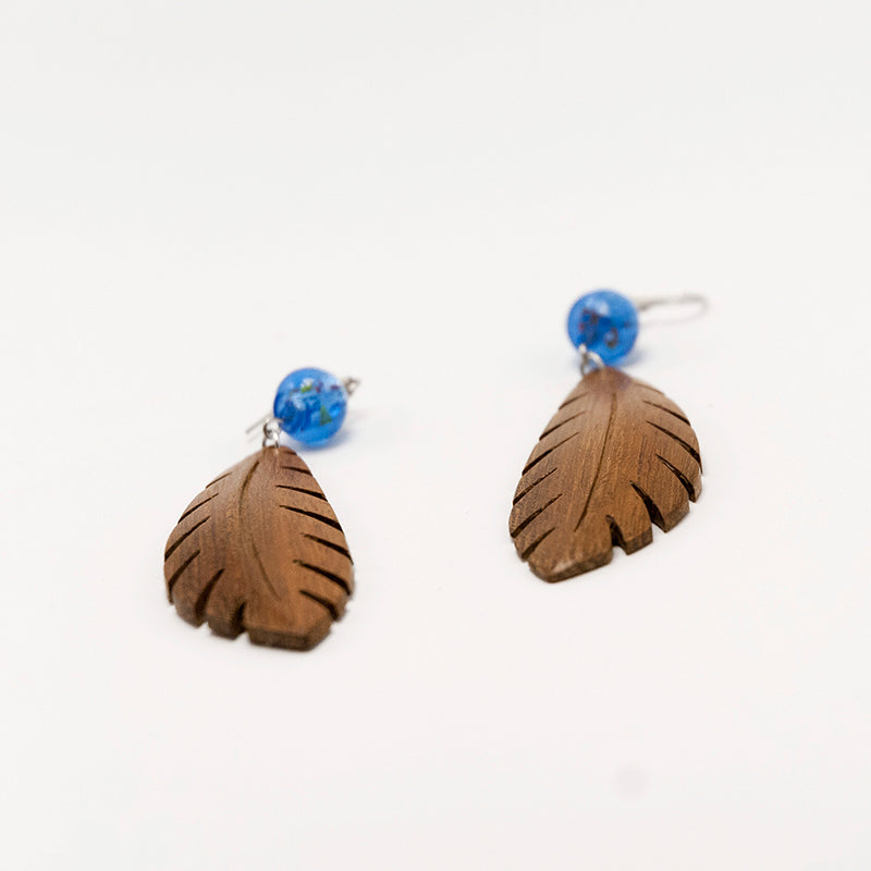 Birgitta. Iroko Leaf Wooden Earrings with Blue murano glass beads A068-3